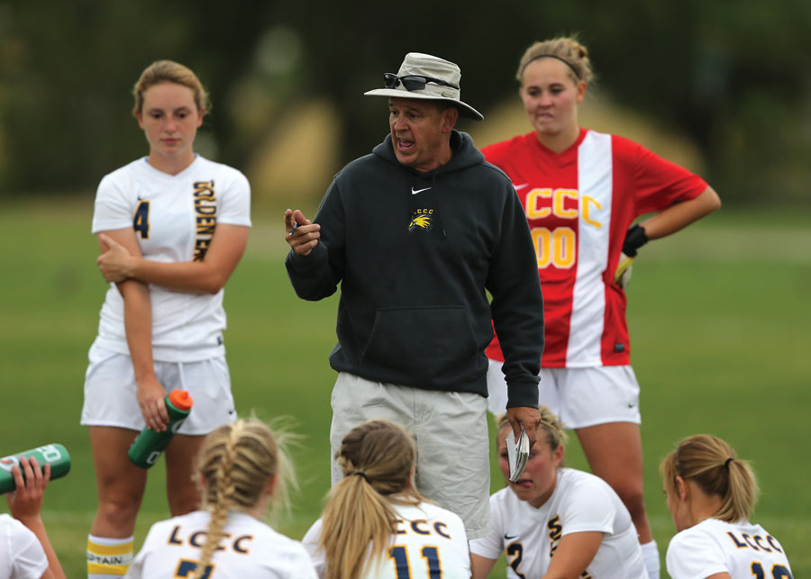 Women’s soccer coach Jim Gardner talks to his team during a game against Otero Junior College. Gardner has produced 29 All-Americans and has won over 200 games.
