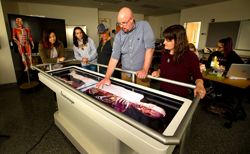 Faculty and students around the digital Cadaver Table