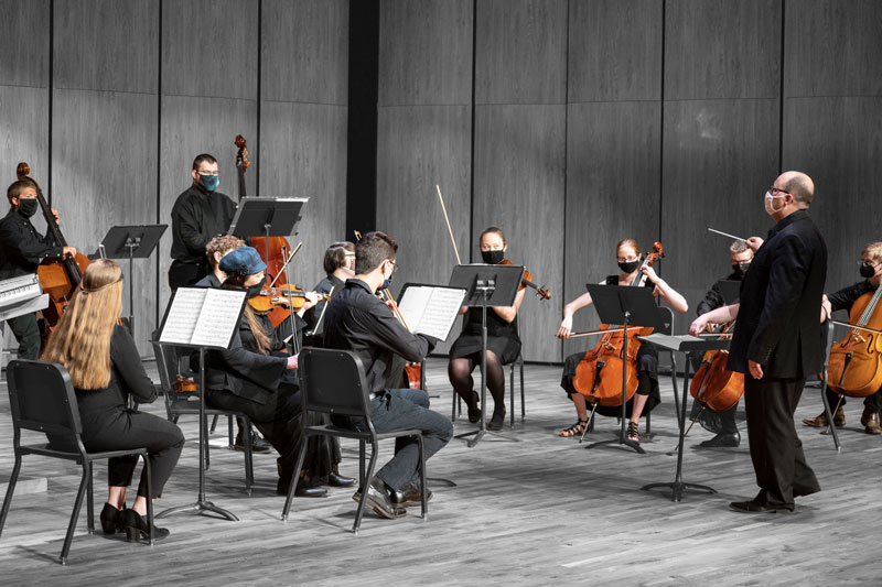 LCCC Orchestra performing with it is recorded for the virtual concert