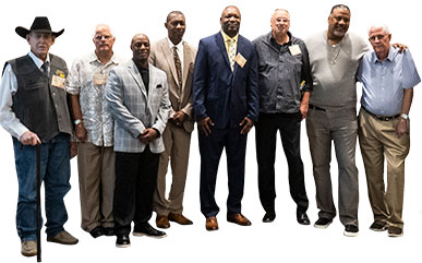 photo of the members of the LCCC Athletics Hall of Fame cut out from the background, standing in a line.