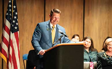 photo of President Schaffer speaking at a podium