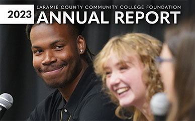 Cover of the annual report with two students with microphones