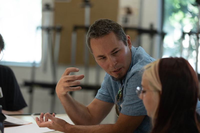 Jason Brubaker speaking to a student at LCCC