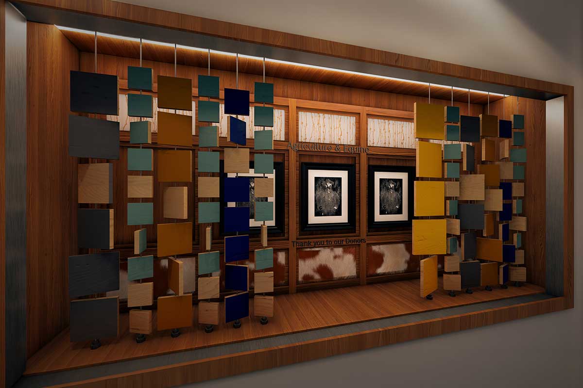 A 3D rendering from an angle of the Ag & Equine wall with donor names. It's inset in a display case area with pictures behind and colored blocks on poles in front.