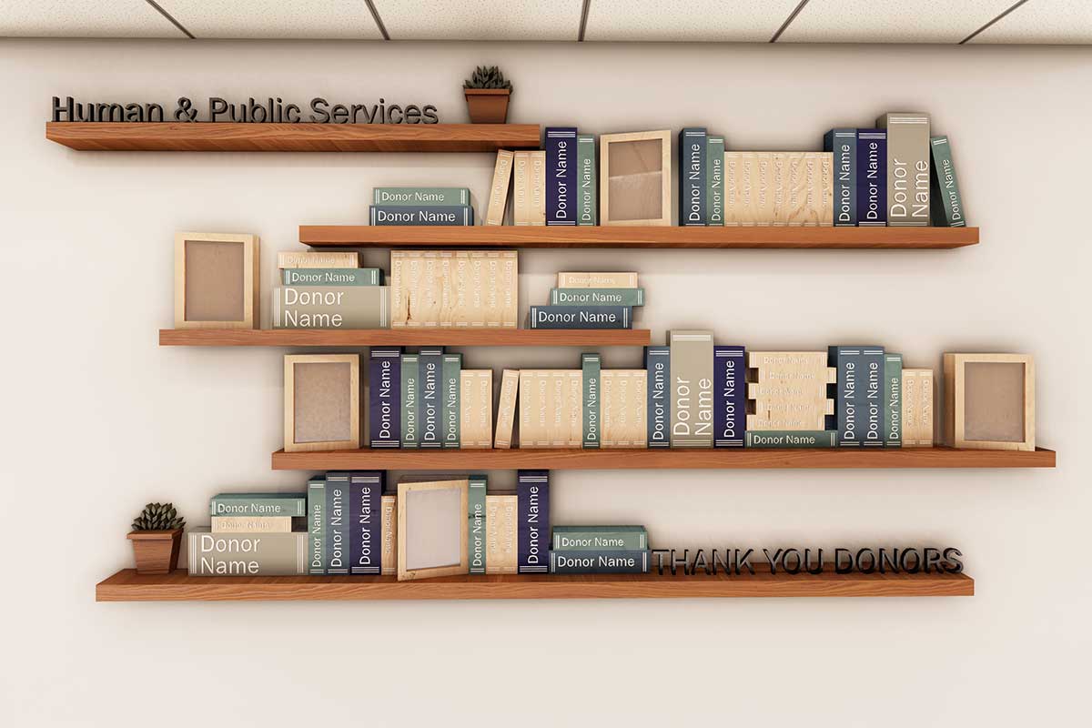 A 3D rendering straight on of the human and public services pathway donor wall with fake books on shelves with donor names on them and plants and the title.