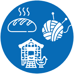 loaf of bread, knitting needles and yarn, chicken and coop