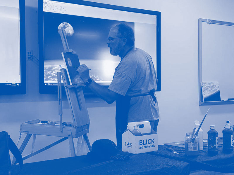 man leading a painting class at ACC