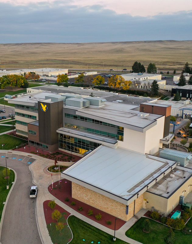 drone view of the Clay Pathfinder Building in the early evening