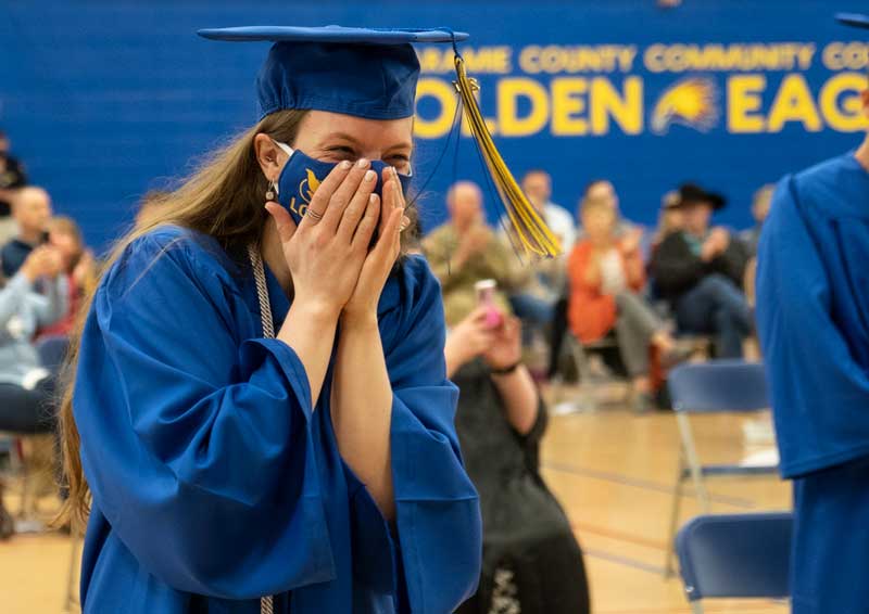 LCCC graduate Allison Dolph, an agriculture-business major, can barely contain her excitement at graduation.