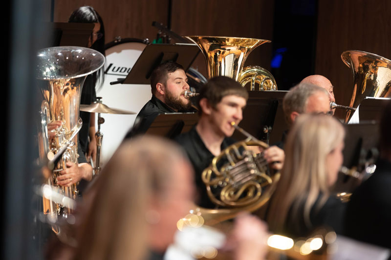 musicians playing tubas during a concert at LCCC