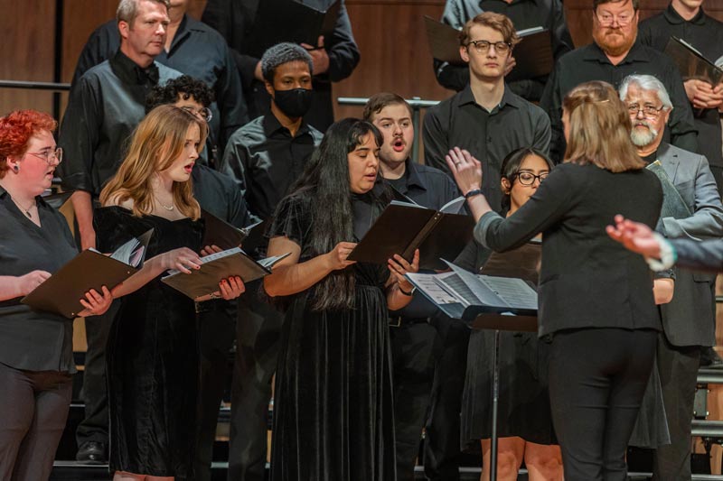 LCCC Choir on stage singing during a concert