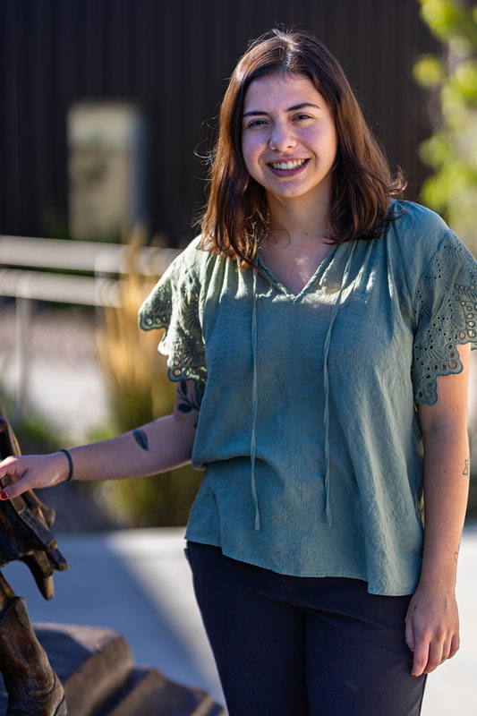 Kyra Lopez smiles on LCCC's campus.