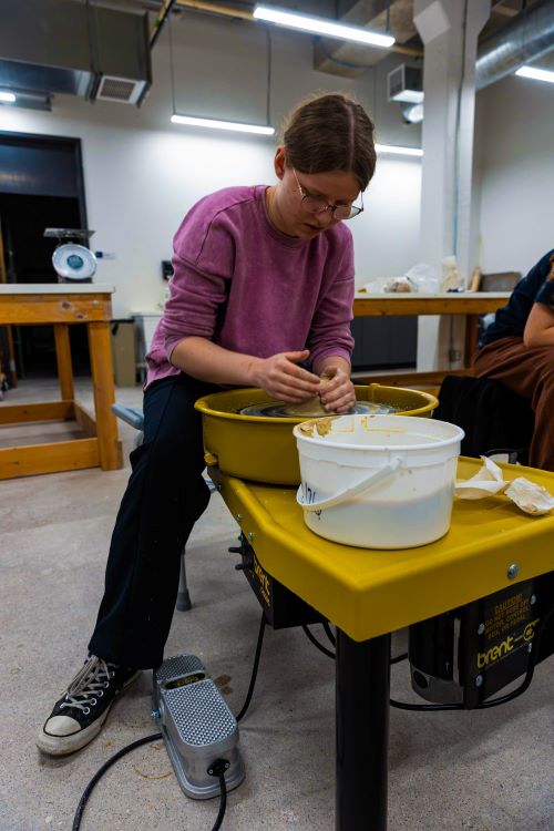 LCCC student Ashley O'Conner uses a new pottery wheel