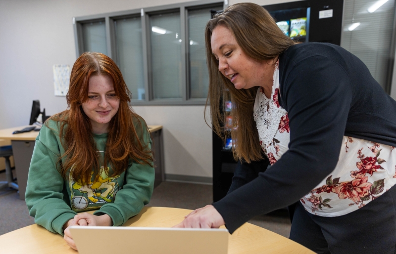 Emma, an LCCC business/accounting major, works with instructor Danielle Adams on the Cheyenne campus.