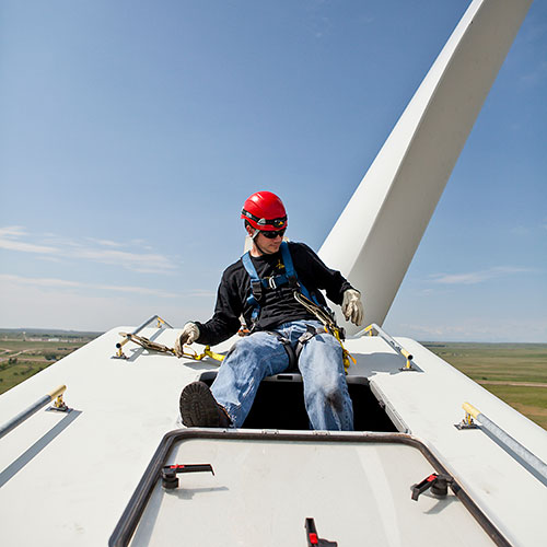 student on a wind turbine