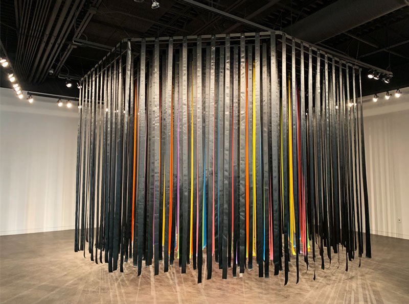 Artwork by Tiffany Matheson with ribbons hanging from the ceiling
