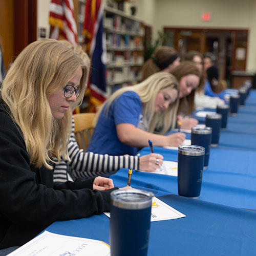 Student signing day at the local high school