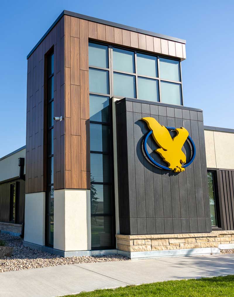 Exterior of the CCI building after the renewal project with the college logo on it