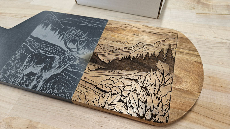 photo of laser etched artwork on a slate and wood board