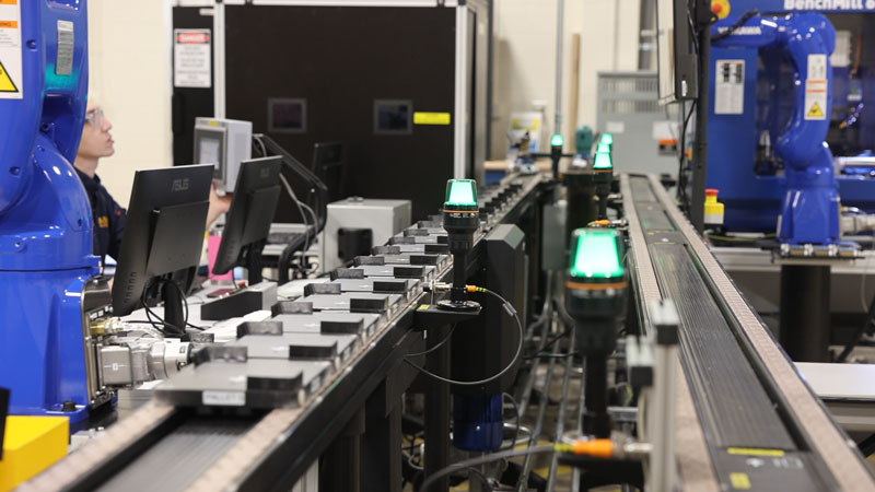 photo of the conveyor belt on the new SmartCim system